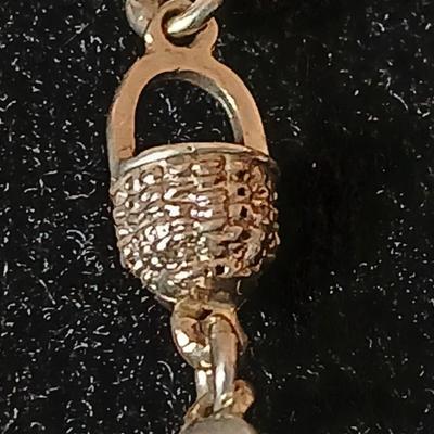 .925 Nantucket basket tennis bracelet and a .925 Taxco Mexico Sterling Silver Grape Cluster pendant