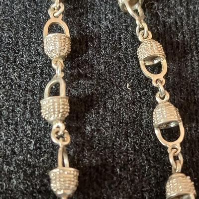 .925 Nantucket basket tennis bracelet and a .925 Taxco Mexico Sterling Silver Grape Cluster pendant