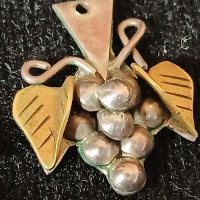 .925 Nantucket basket tennis bracelet and a .925 Taxco Mexico Sterling Silver Grape Cluster pendant