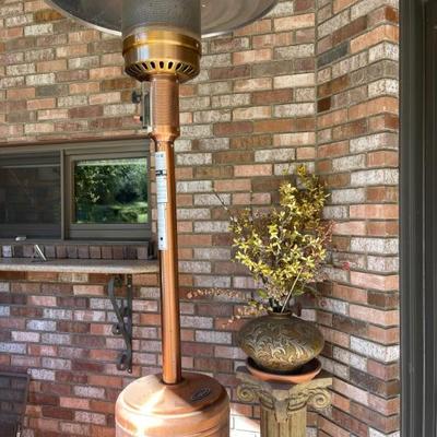 Copper  colored patio heater 