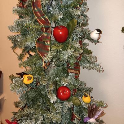 VERY NICE WREATH, GARLAND AND A FAUX LIGHTED TREE WITH LIFE LIKE TRUNK