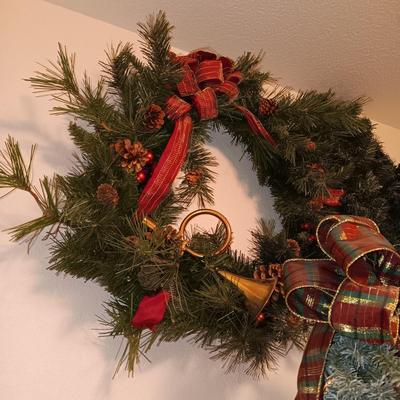 VERY NICE WREATH, GARLAND AND A FAUX LIGHTED TREE WITH LIFE LIKE TRUNK