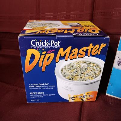 1 1/2 QUART SIP MASTER CROCK POT AND AN AUTO-A-SERVE PUMP POT FOR HOT OR COLD BEVERAGES