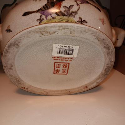 TERRA COTTA ROASTER AND A CLAY BIRD THEMED BOWL