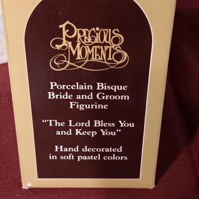 PRECIOUS MOMENTS AND RUSS BRIDE AND GROOM FIGURINES