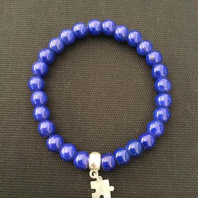 Crackly cobalt, blue beaded stretch bracelet, puzzle, piece charm