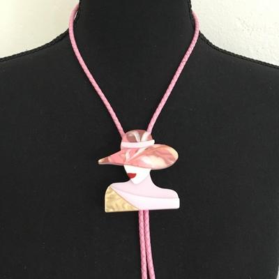 Pretty in pink, leather and gold, acrylic lady, pendant bolo tie
