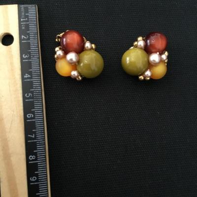 Beautiful warm color beaded go pro clip on earrings
