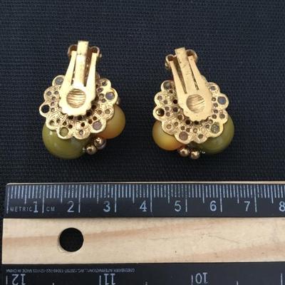 Beautiful warm color beaded go pro clip on earrings