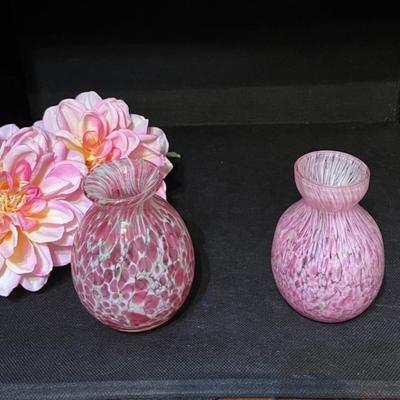 Pink blown glass vases and flowers