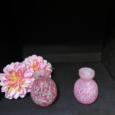 Pink blown glass vases and flowers