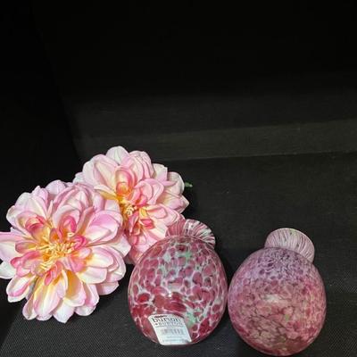 Pink blown glass vases and flowers