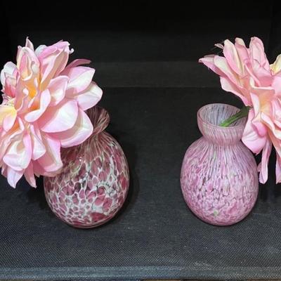 Pink blown glass vases and flowers