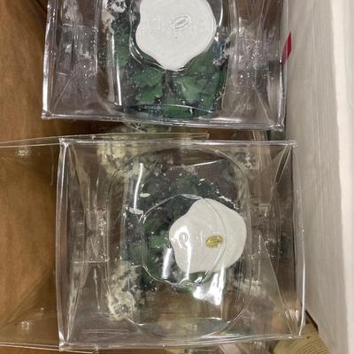Box full of village trees for Christmas