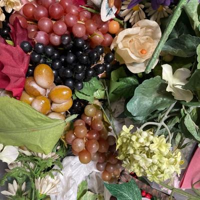 Totes and boxes of crafting flowers