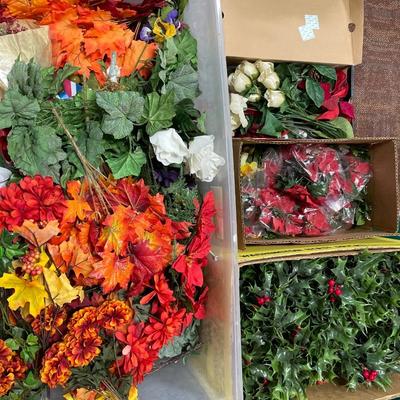 Totes and boxes of crafting flowers