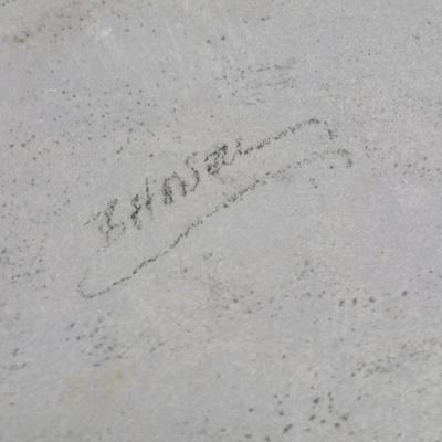 Two purple pottery dishes with signatures on the backs