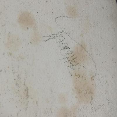 Two purple pottery dishes with signatures on the backs