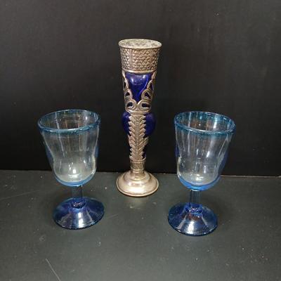 Mexican Hand Blown Colbalt Blue Stem & Rim Goblet Glasses with a vintage blue glass vase with silver colored decorative design