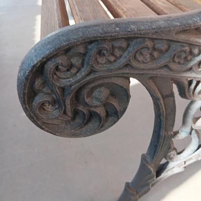 ORNATE CAST IRON PATIO BENCH WITH WOODEN SLATS