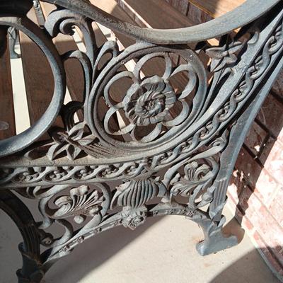 ORNATE CAST IRON PATIO BENCH WITH WOODEN SLATS