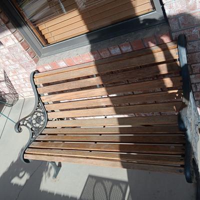 ORNATE CAST IRON PATIO BENCH WITH WOODEN SLATS