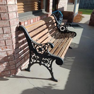 ORNATE CAST IRON PATIO BENCH WITH WOODEN SLATS