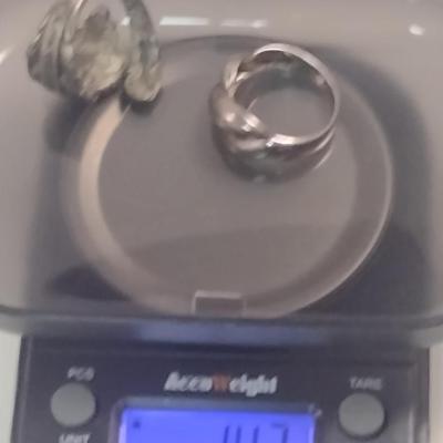 Pair of Sterling Silver Rings- Sizes 8 and 7 (#48)