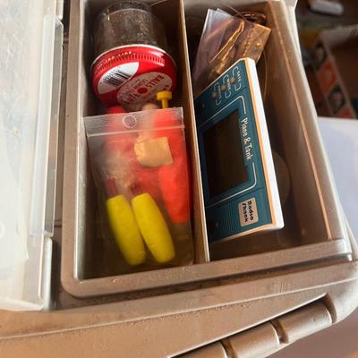 Fish tackle box filled with fishing items