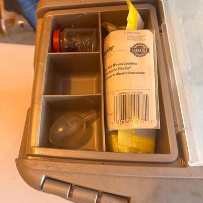 Fish tackle box filled with fishing items