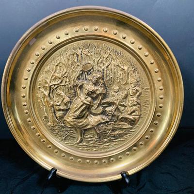 LOT 31: Collection of Embossed Brass Wall Plate