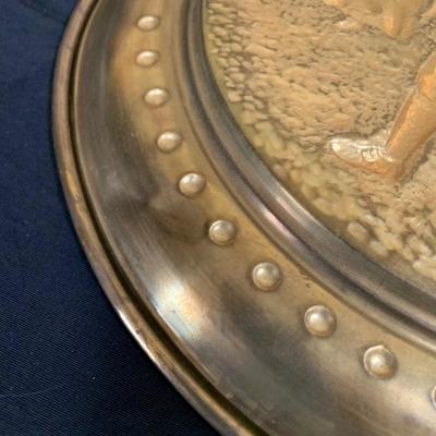 LOT 31: Collection of Embossed Brass Wall Plate