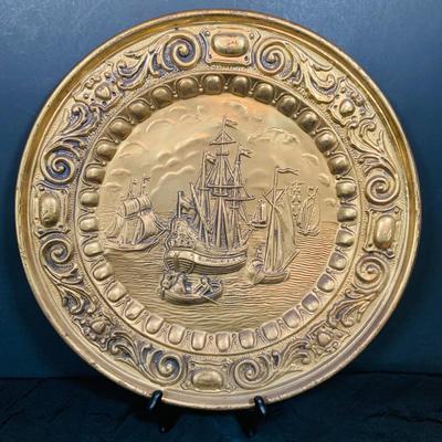 LOT 31: Collection of Embossed Brass Wall Plate