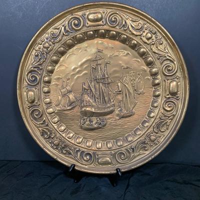 LOT 31: Collection of Embossed Brass Wall Plate