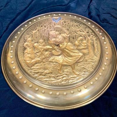LOT 31: Collection of Embossed Brass Wall Plate