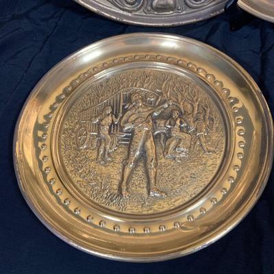 LOT 31: Collection of Embossed Brass Wall Plate