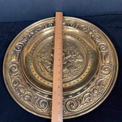 LOT 31: Collection of Embossed Brass Wall Plate