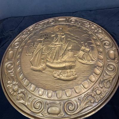 LOT 31: Collection of Embossed Brass Wall Plate