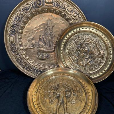 LOT 31: Collection of Embossed Brass Wall Plate