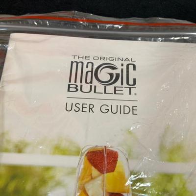 LOT 33: Magic Bullet with Extra Tops and a Anova Vacuum Sealer Pro In Original Box