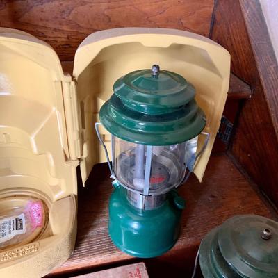 LOT 37: Set of 2 Colman Lanterns One with the Original Box and the Other in a Hard Plastic Caring Case and Frabill’s Lantern Shields In...