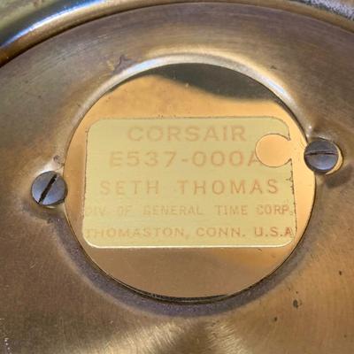 LOT 43: Collection Nautical Instruments Including a Seth Thomas Brass Ships Clock, Brass Ship’s Wheel Barometer and Lorus Quartz World...