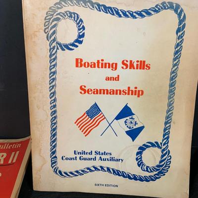LOT 52 Military Collection Including WWIi Headlines Book,Coast Gaurd Boating Skills Book, 1940 Navy BlueJacket Manual, Metal and More