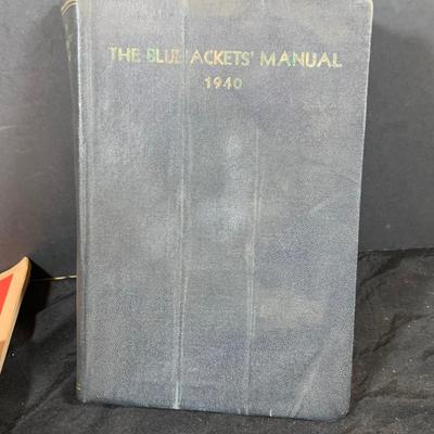 LOT 52 Military Collection Including WWIi Headlines Book,Coast Gaurd Boating Skills Book, 1940 Navy BlueJacket Manual, Metal and More