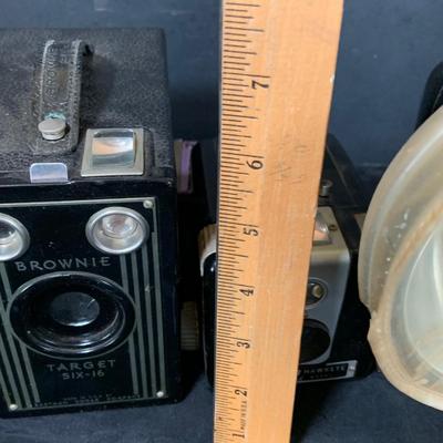 LOT 54: Vintage Camera Collection Including Brownie Hawkeye with Flash, Brownie Box Camera and Kodak Petite Folding Cameria