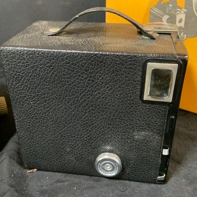 LOT 54: Vintage Camera Collection Including Brownie Hawkeye with Flash, Brownie Box Camera and Kodak Petite Folding Cameria
