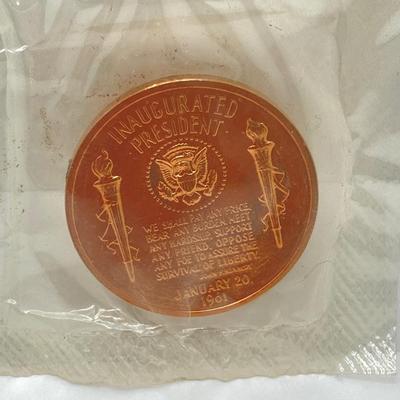 LOT 55: Four Bronze Inaugurated Presidential Medals / Tokens in Original Sealed Package - John F. Kennedy, James Garfield, Theodore...
