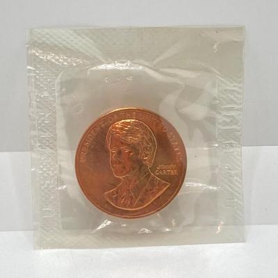 LOT 55: Four Bronze Inaugurated Presidential Medals / Tokens in Original Sealed Package - John F. Kennedy, James Garfield, Theodore...