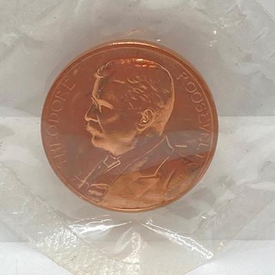 LOT 55: Four Bronze Inaugurated Presidential Medals / Tokens in Original Sealed Package - John F. Kennedy, James Garfield, Theodore...