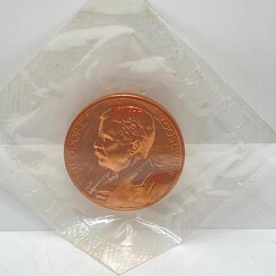 LOT 55: Four Bronze Inaugurated Presidential Medals / Tokens in Original Sealed Package - John F. Kennedy, James Garfield, Theodore...